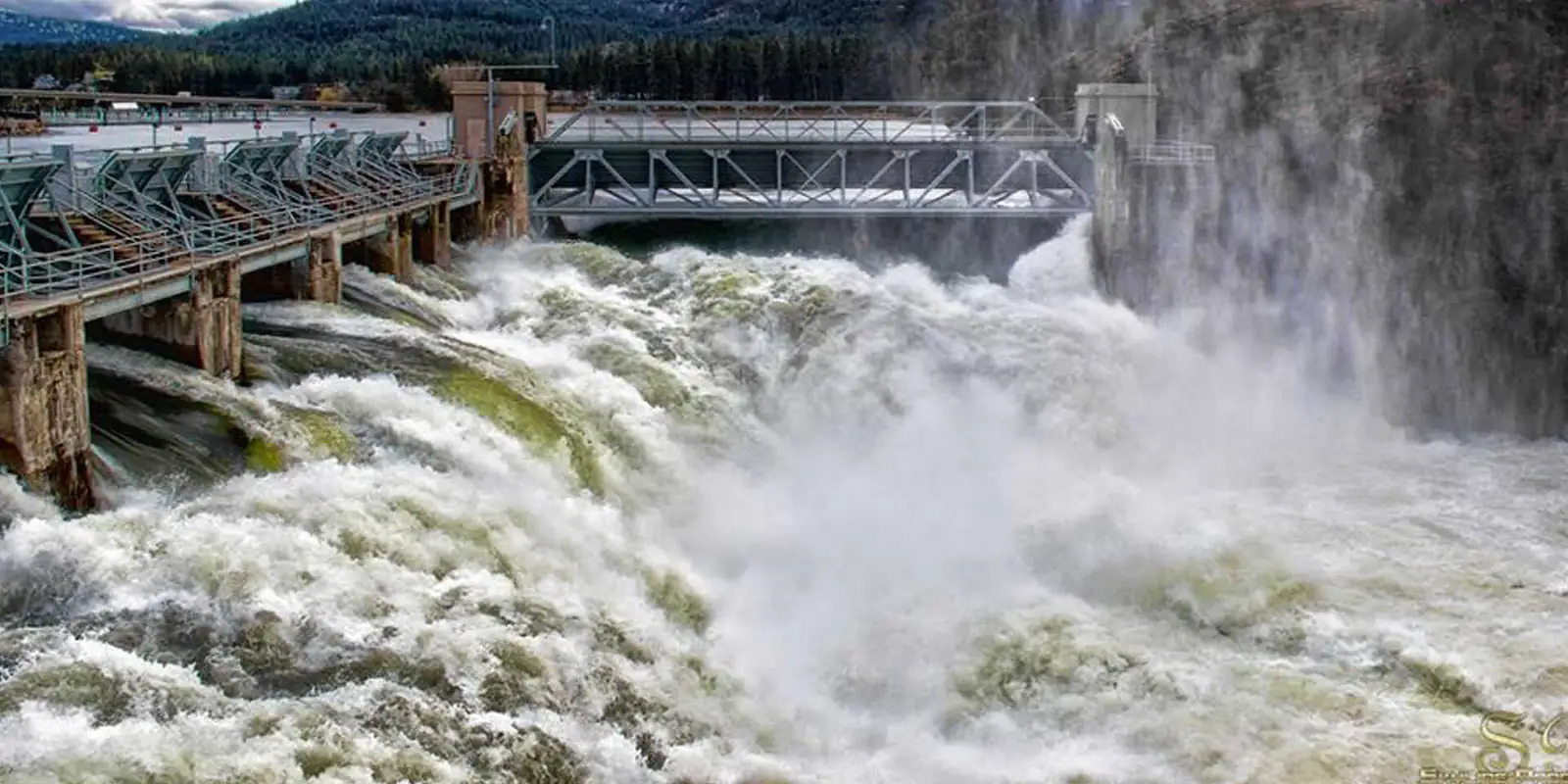 Water rushing over the Post Falls Dam spillway on the Spokane River