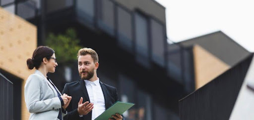 man speaking with realtor