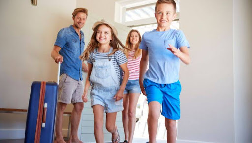 family entering vacation rental